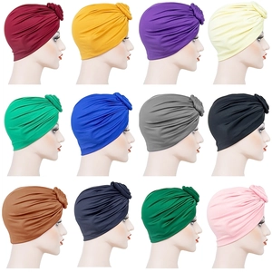Set of 12 colorful milk silk turban hats for women with stylish knotted donut design