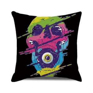 Detail of Halloween pillow case with colorful melting skull and eyeball design on white back