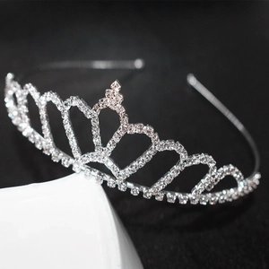 Close-up of a silver plated princess crown headband with shimmering crystal rhinestones