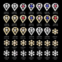 Detailed grid view of assorted crystal nail charms with gold and silver alloy plating