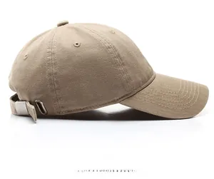 Close-up of side view light khaki cotton baseball cap with adjustable metal buckle