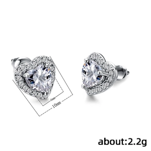 Elegant heart-shaped zircon stud earrings in silver finish with size and weight details