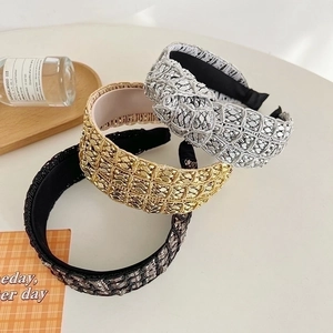 Knotted metallic wide headband set in gold, silver, and black mesh braided texture