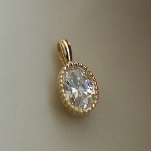 S925 silver bracelet featuring oval white crystal teardrop pendant in milgrain setting