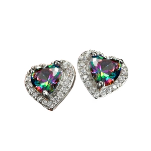 Macro detail of heart-shaped mystic topaz stud earrings with sparkling white cubic zirconia