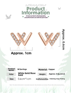 Detail showing letter W stud earring in rose gold with sparkling micro-inlaid cubic zirconia
