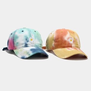 Detail of kids tie-dye bucket hats with daisy embroidery and adjustable wind ropes