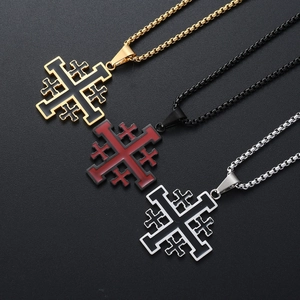 Religious Jerusalem cross necklaces in gold, black, and silver finish on black background