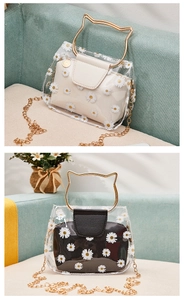 Transparent PVC handbags with cat ear metal handles and daisy print inner pouches