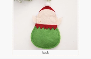 Detailed back view of Christmas gingerbread man cutlery holder with red and green felt texture