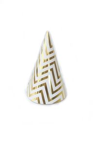 Close-up of golden zigzag pattern on party hat with premium metallic foil texture