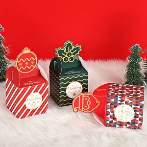Christmas gift boxes with festive patterns and decorative toppers on a red background