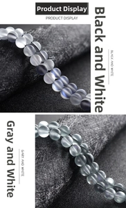 Macro detail of frosted matte agate beads in monochrome black and grey for DIY jewelry