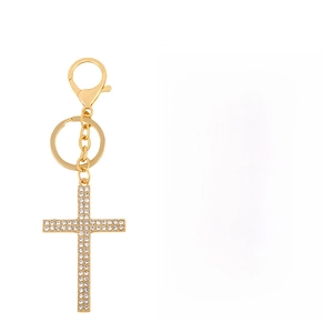 Detail view of golden alloy cross keychain with crystal inlay and dimension specifications