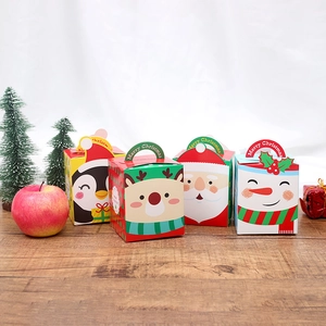 Set of four colorful Christmas gift boxes with Santa and Reindeer cartoon patterns
