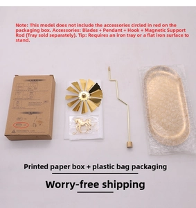 Detailed set of golden spinning carousel candle holder parts with oval tray and packaging