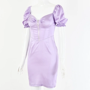 Detail of purple satin dress featuring puff sleeves, front zipper and metal O-ring