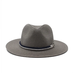 Grey woven straw sun hat with wide brim, blue decorative cord and silver star emblem