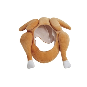 Macro detail of plush roasted turkey hat with soft brown fabric and white bone accents
