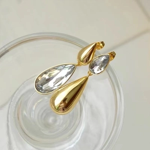 925 silver crystal teardrop earrings with gold finish and asymmetrical vintage design