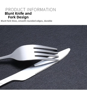 Detailed close-up showing smooth polished edges and safe blunt design of the metal fork and knife