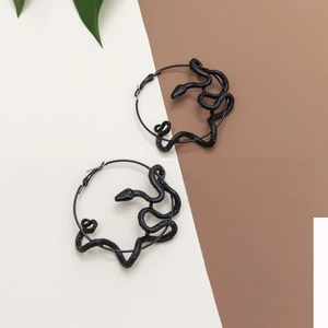 Gothic style black snake hoop earrings featuring 3D scale texture on a neutral background
