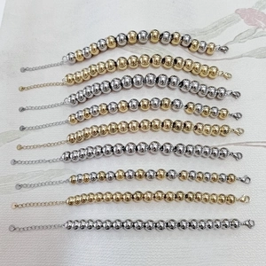 Men's polished stainless steel bead bracelets in gold and silver finish with lobster clasp