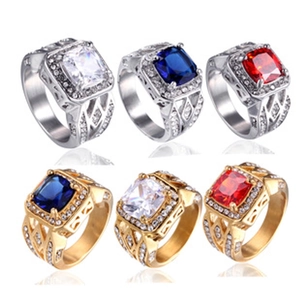 Selection of anxiety rings with colorful square gemstones in gold and silver finishes
