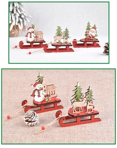 Detail of wooden Christmas sleigh decoration featuring snowman and reindeer figurines
