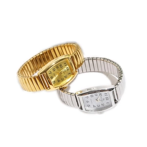 Vintage rectangular quartz watch with flexible metal stretch band in gold and silver