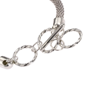 Silver diamond-set mesh link bracelet watch with a decorative twisted toggle clasp closure