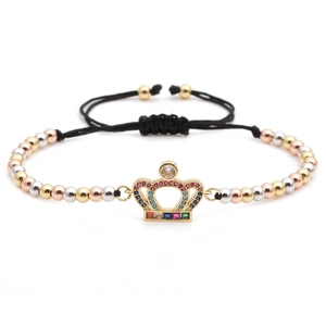 Detail of beaded crown bracelet with cubic zirconia and adjustable woven black cord