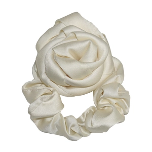 Elegant cream-white satin rose flower scrunchie hair tie with a glossy finish