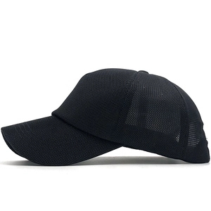 Detail view of the breathable mesh fabric texture on the black summer baseball cap