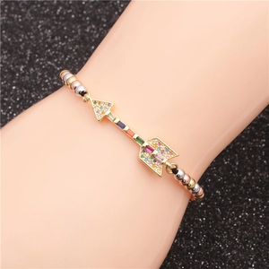 Braided bracelet with colorful zircon arrow charm and tri-color metallic beaded chain
