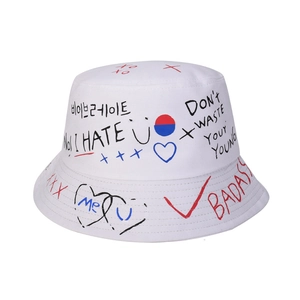 White cotton bucket hat with graffiti prints and Korean text on a clean white background