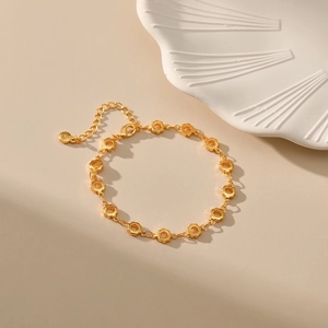 18K gold-plated brass hollow flower chain bracelet with adjustable clasp closure