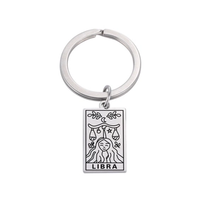 Libra zodiac stainless steel keychain with rectangular charm on white background