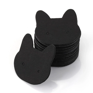 Black cat-shaped earring display cards in a stack for jewelry packaging and display