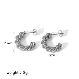 Detailed view of silver twisted croissant earrings with 20mm height and 5mm thickness