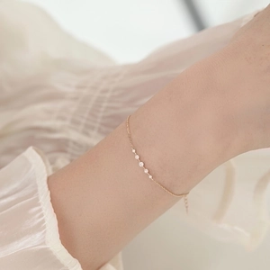 Pulsera de plata 925 bañada en oro de 14k con cinco circonitas redondas brillantes