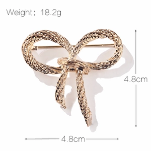 Golden textured bow brooch with twisted rope pattern for women, 4.8cm elegant accessory
