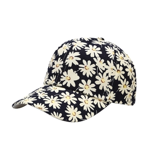 Classic black baseball cap featuring white daisy floral patterns for sun protection