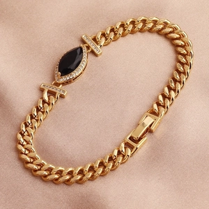 Gold Cuban chain bracelet with marquise black stone and sparkling white crystals