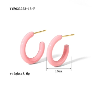 Detail view of pink enamel C-shaped earrings showing 16mm diameter and 3.6g weight