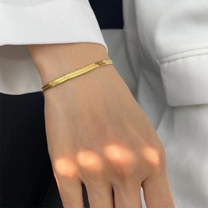 Elegant gold herringbone snake chain bracelet for women in a minimalist style