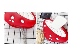 Detailed view of the mushroom-shaped crossbody bag featuring red and white PU leather