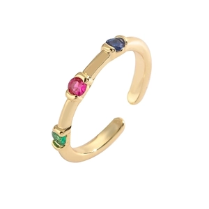 Bohemian adjustable golden ring with vibrant green, red, and blue zircon gemstones