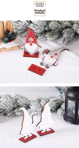 Detail of DIY painted wooden Christmas gnome figurines with snowflake hats and bases