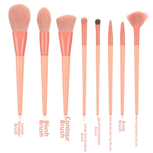 Detail of 8pcs coral pink makeup brush set showing various bristles and matte handles